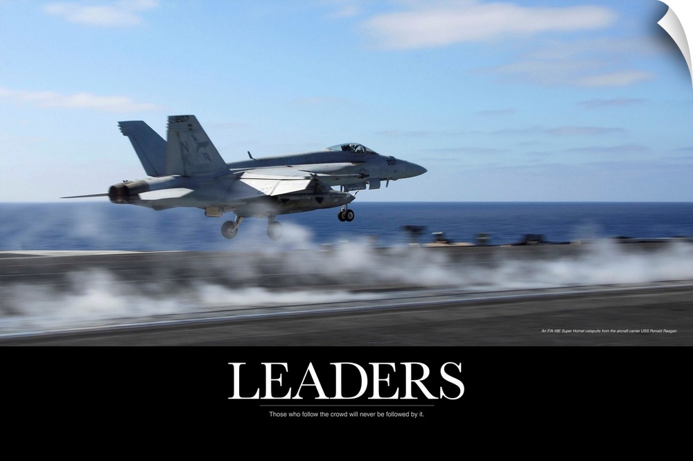 Motivational Poster: An F/A-18E Super Hornet catapults from an aircraft carrier