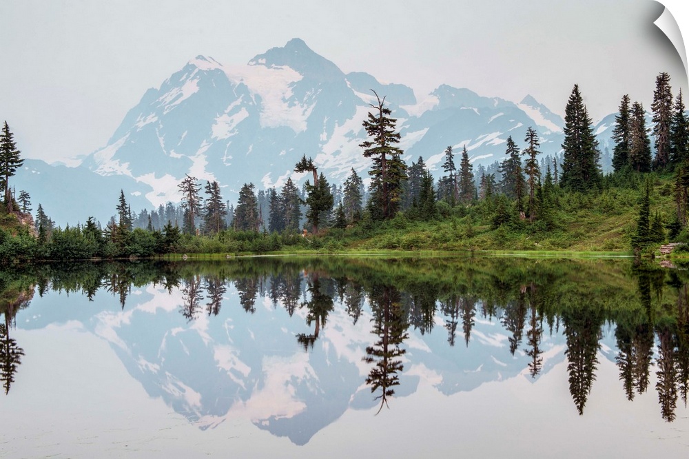 Mount Shuksan's Peak is reflected in Picture Lake near Mount Shuksan, Washington.