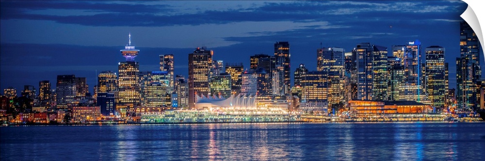 Panorama of Vancouver skyline at night in British Columbia, Canada.