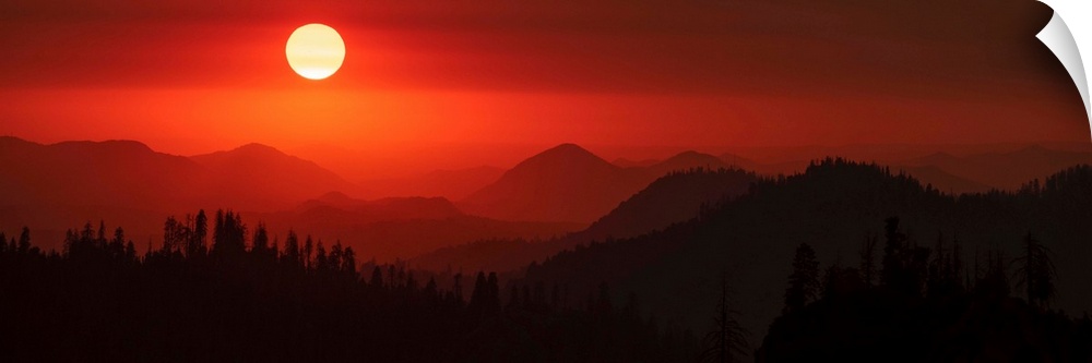 Panoramic view of a darkened red sky in Sequoia National Park, California.