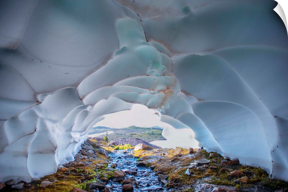 Glacier caves are often carved out by water running through or under the glacier's ice.