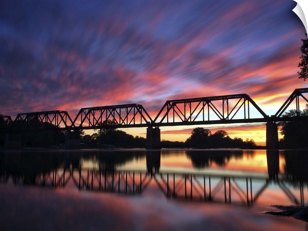 Photograph of a bridge silhouette at sunset in Providence Metropark.