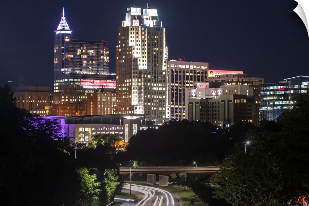 Skyscrapers in Raleigh illuminated at night, seen from McDowell Street, North Carolina.