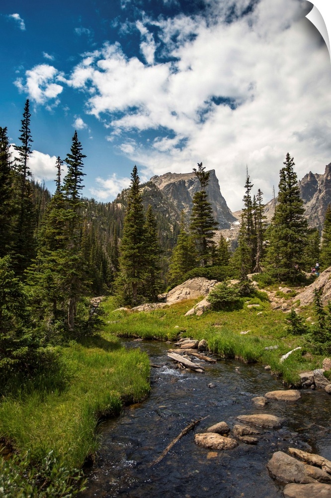 Landscape photograph of a stream going through Rocky Mountain National Park on a beautiful day.