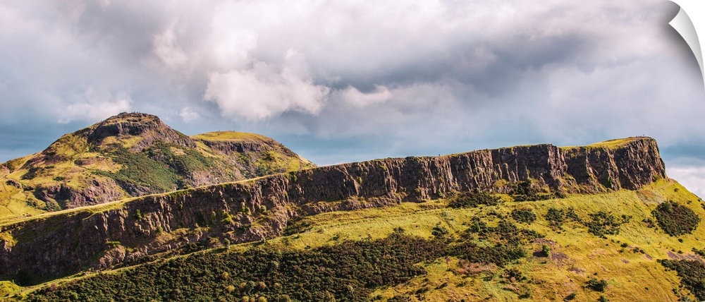 View of Salisbury Crags cliff at Arthur's Seat and Holyrood Park in Edinburgh, Scotland.