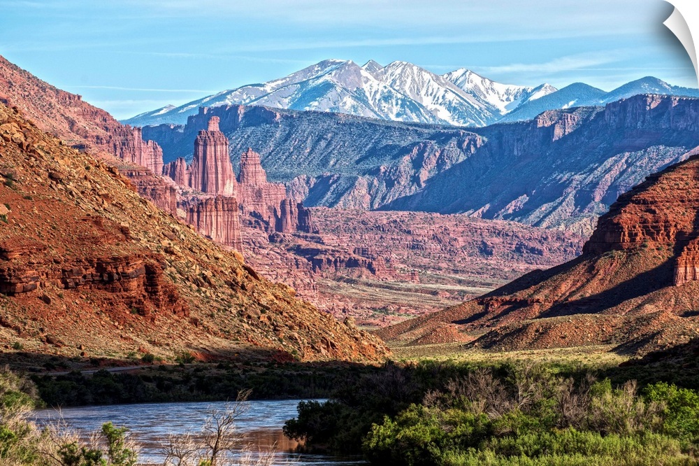 A river running through the Salt Valley of Arches National Park, with a view of the Fiery Furnace and the La Sal Mountains...