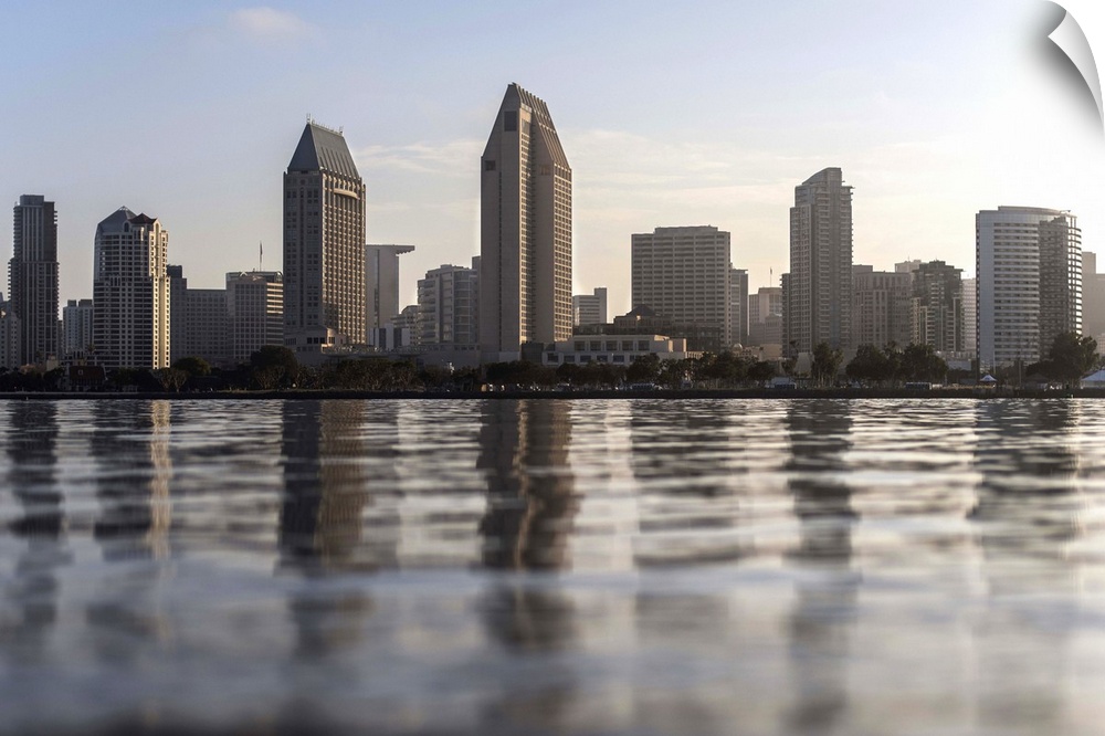 Photograph of the San Diego, California skyline from the water just before sunset.