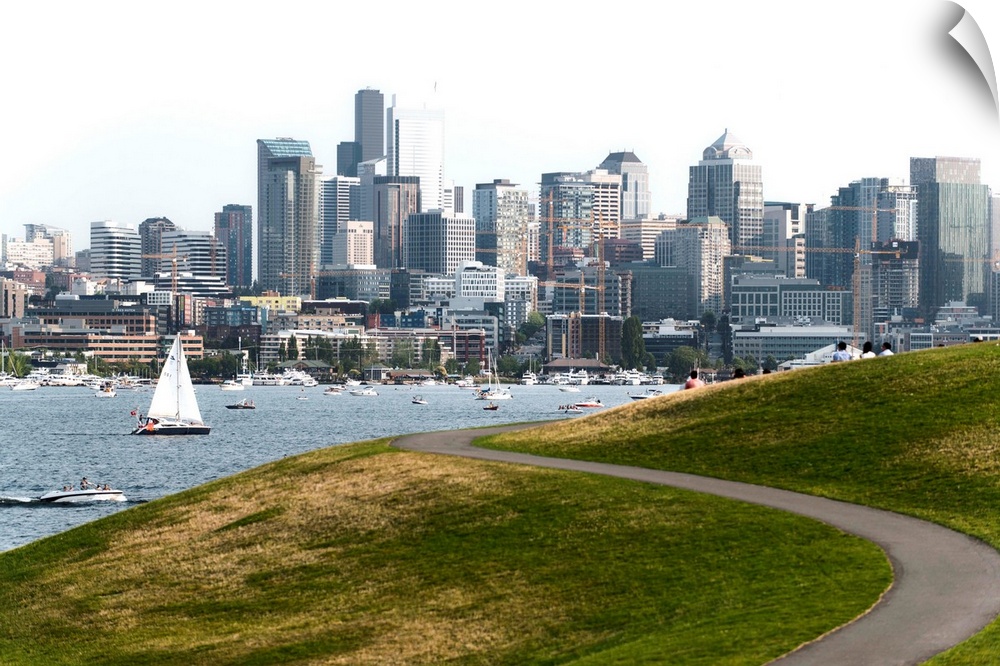Photograph of the Seattle skyline with Lake Washington filled with boats in front.