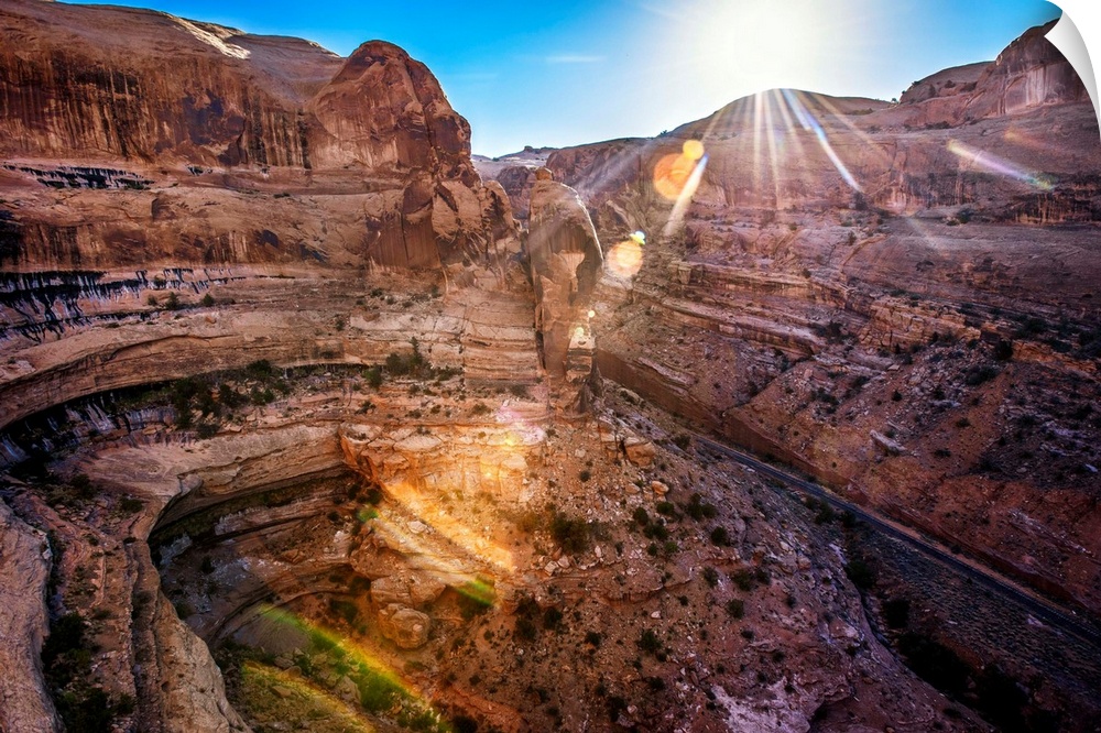The sun shining on Shafer Canyon, Canyonlands National Park, Utah