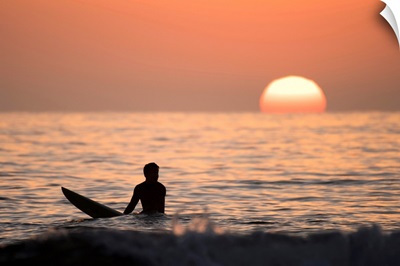 Silhouetted Surfer at Sunset, San Diego Coast, California