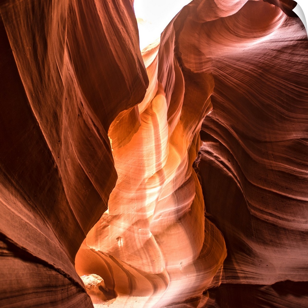 Square photograph inside of Antelope Canyon rock formation located on the Navajo Reservation in Page, Arizona with flowing...