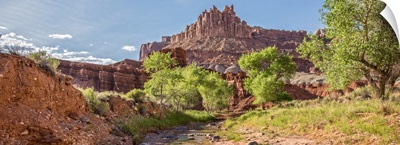 The Castle Rock Formation Near A Stream at Capitol Reef National Park