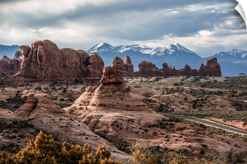 Fiery Furnace sandstone rock formations with the La Sal Mountains in the distance, Arches National Park, Utah.