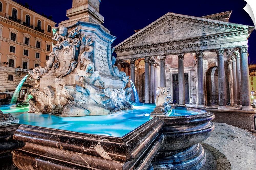 Photograph of the Pantheon Fountain lit up at night in Piazza della Rotond, Rome.