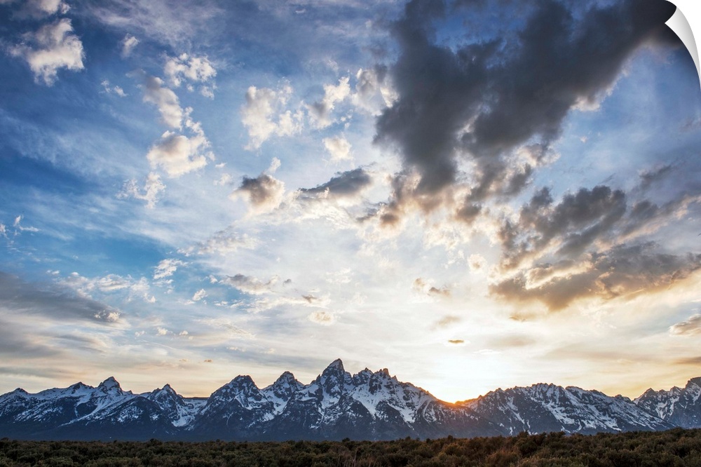 View of clouds over Teton mountains in the morning in Wyoming.