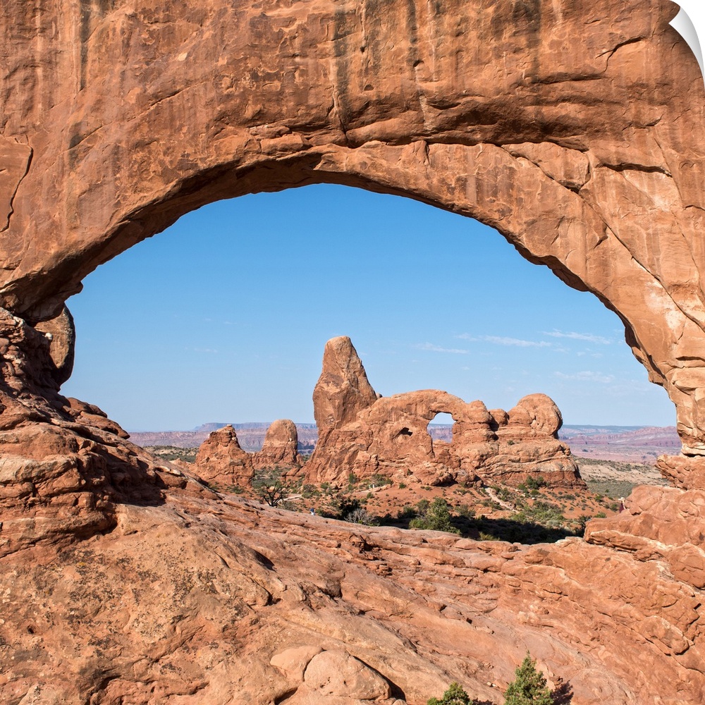 The Turret Arch seen through the North Window Arch, on Windows hiking trail, Arches national Park, Moab, Utah.