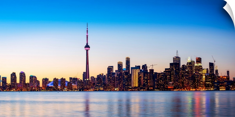 Photo of Toronto city skyline at sunset, Ontario, Canada.