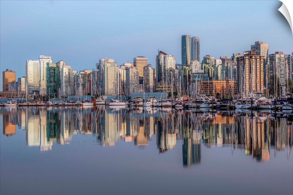 Vancouver skyline with boats in Vancouver, British Columbia, Canada.