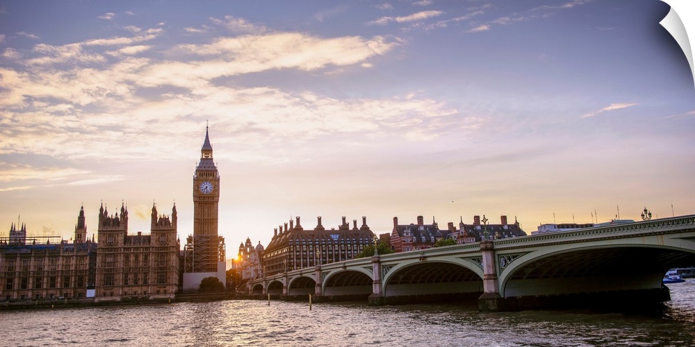 Panoramic photograph of the Westminster Bridge over the River Thames with Big Ben in the background at sunset, Westminster...