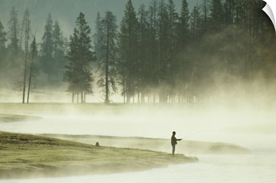 Fishermen in the morning mist on the Madison River, Yellowstone National Park, Wyoming