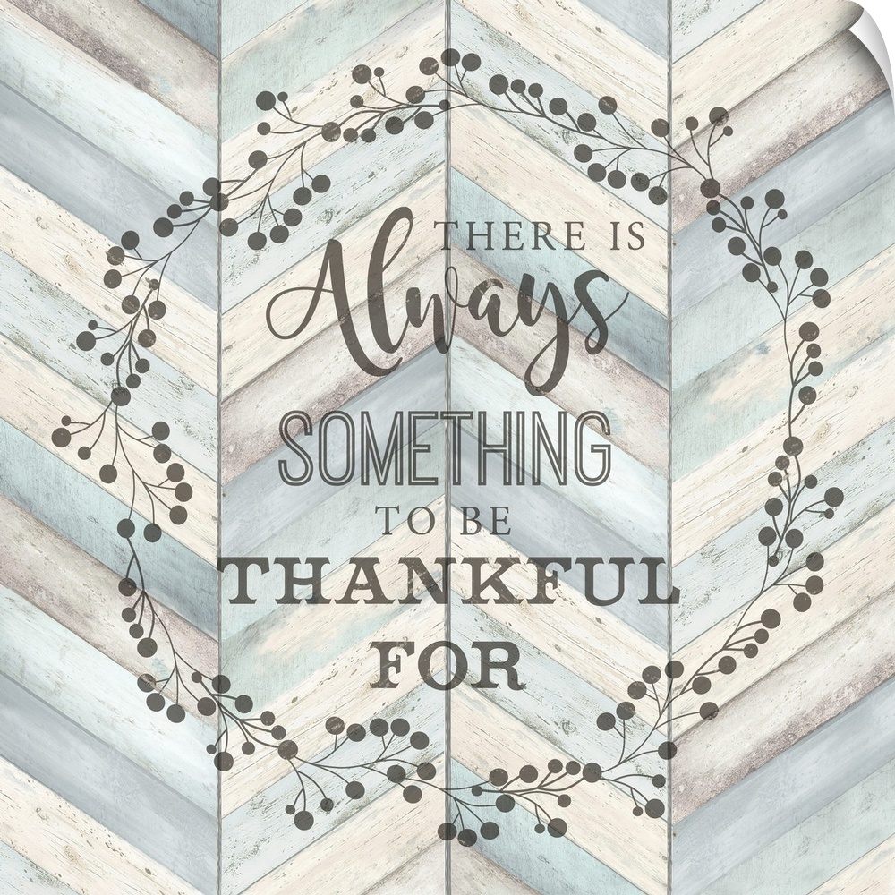 "There Is Always Something To Be Thankful For" surround by a wreath on a chevron wood background.