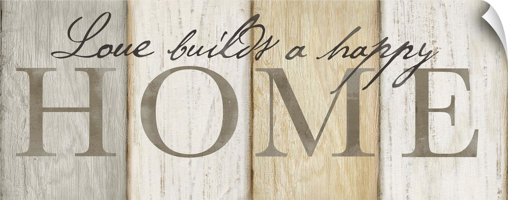 "Love builds a happy Home" on a neutral multi-colored wood plank background.