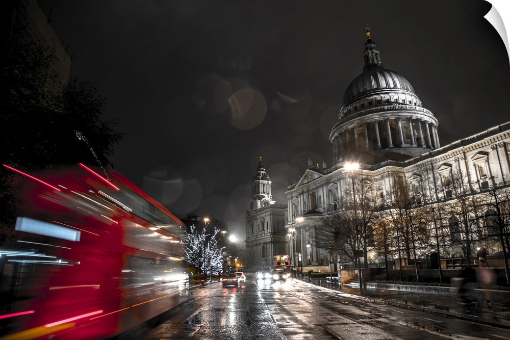 A London bus drives past St. Paul's Cathedral towards Christmas lights, London, England, United Kingdom, Europe