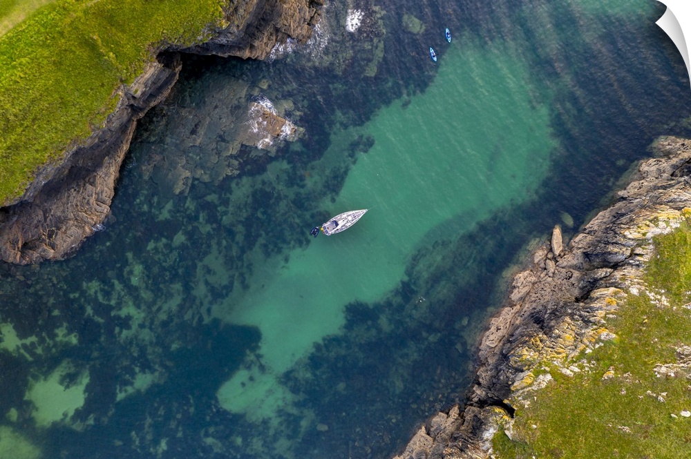 Aerial view of a yacht moored in Port Quin, Cornwall, England, United Kingdom, Europe