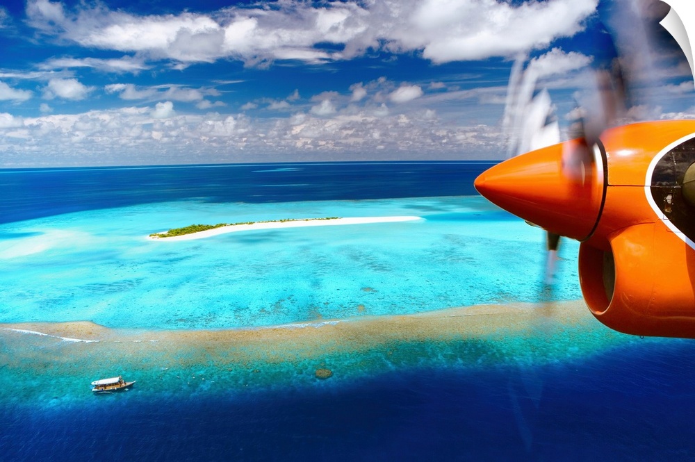 Aerial view of island and seaplane, Male Atoll, The Maldives, Indian Ocean, Asia