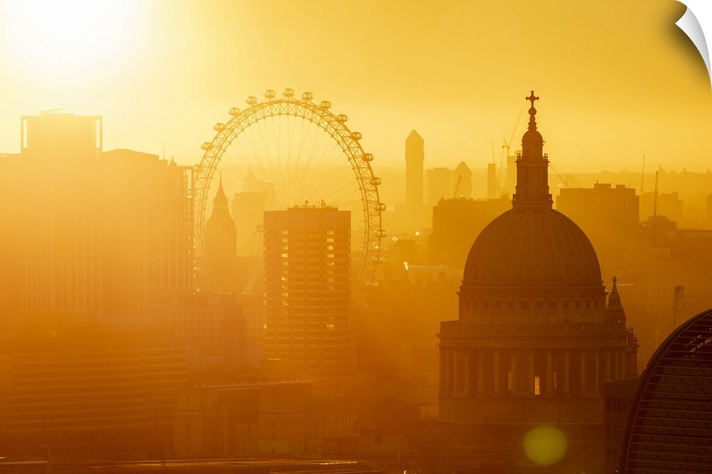 Aerial view of London skyline at sunset, including London Eye and St. Paul's Cathedral, London, England, United Kingdom, E...