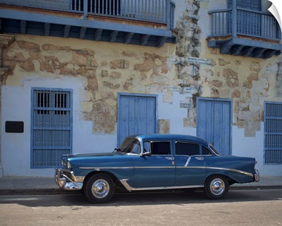 An old blue Chevrolet car parked in a street in Old Havana, Cuba, Caribbean