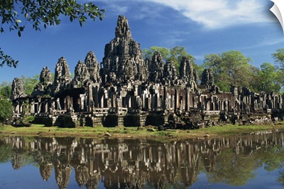 Bayon Temple reflected in water at Angkor, Siem Reap, Cambodia, Indochina