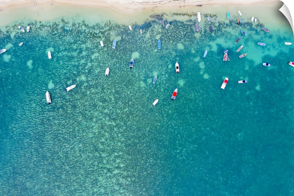 Aerial by drone of boats in the turquoise water of lagoon front of Mont Choisy beach, north-west coast, Mauritius, Indian ...