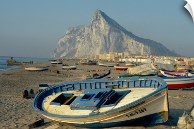 Boats pulled onto beach below the Rock of Gibraltar, Gibraltar
