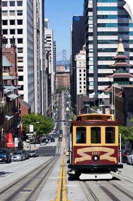 Cable car crossing Street in San Francisco, California