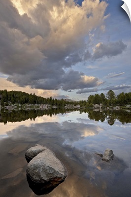 Cloud at sunset reflected in an unnamed lake, Shoshone National Forest, Wyoming