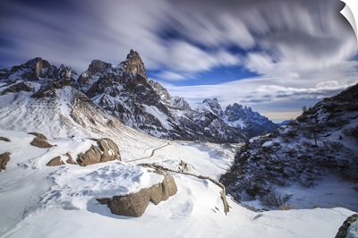 Cloudy Winter Sky On The Snowy Peaks Of The Pale Di San Martino, Dolomites, Italy