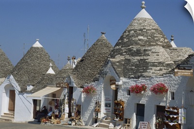 Conical roofs and whitewashed walls of Trullis in Alberobello, Puglia, Italy