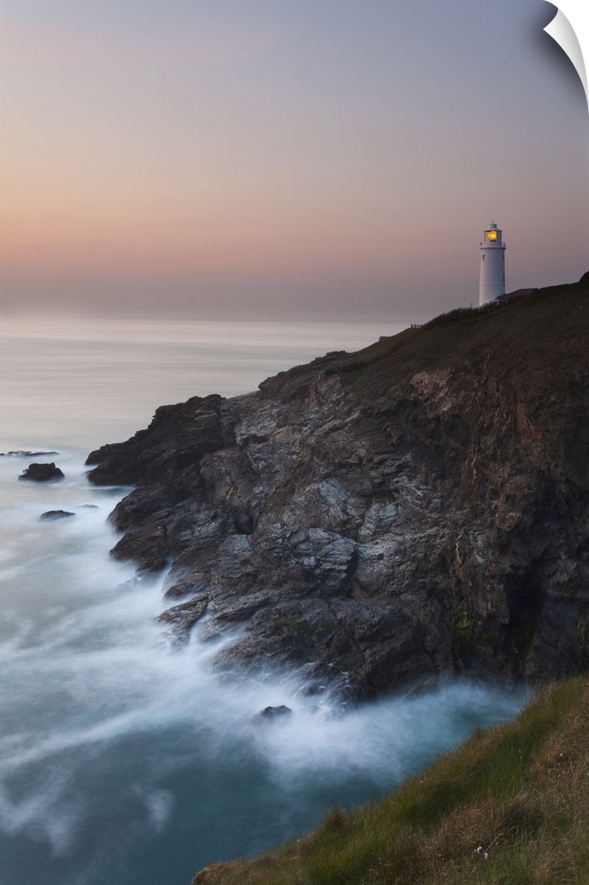 A peaceful dusk on Cornwall's Atlantic coast, showing the lighthouse at Trevose Head, near Padstow, Cornwall, England, Uni...