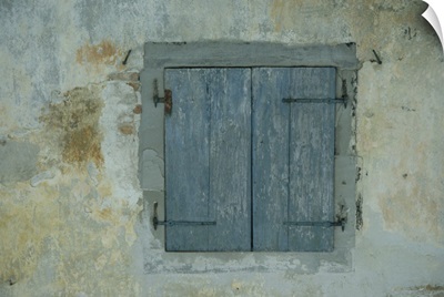 Detail of old blue shutters on a house in the Rhone Alpes in France, Europe
