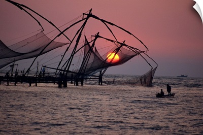 Fishing nets at sunset, Cochin, Kerala state, India, Asia