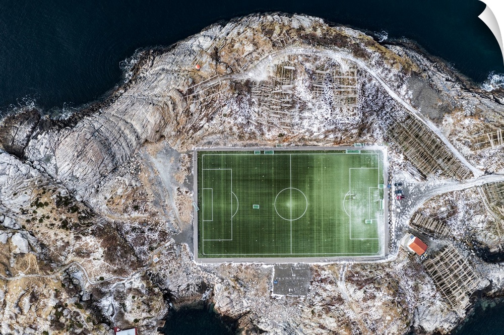 Football field on islet from above, aerial view, Henningsvaer, Nordland county, Lofoten Islands, Norway, Scandinavia, Europe