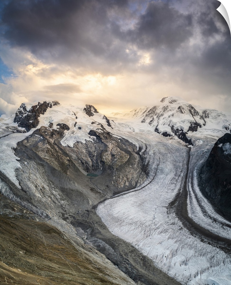 Gorner Glacier (Gornergletscher) with majestic Lyskamm and Monte Rosa peaks at sunset, Zermatt, Valais Canton, Swiss Alps,...