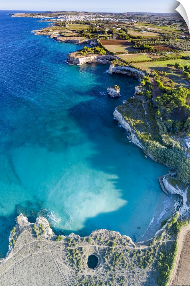 Aerial view of the open grotto known as Grotta Sfondata on cliffs along the coastline, Otranto, Lecce, Salento, Apulia, It...