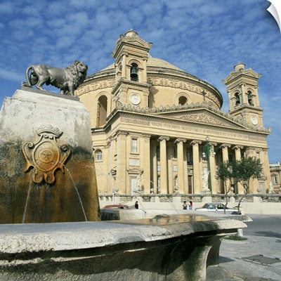 Lion on a fountain in front of the Rotunda church at Mosta, Malta, Europe