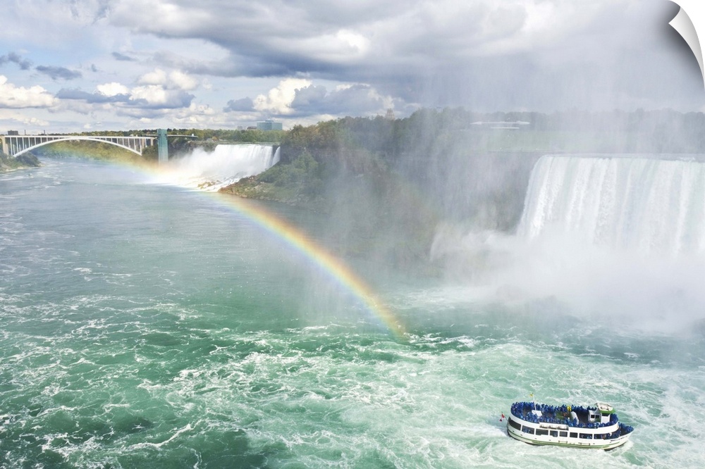 Maid of the Mist tour boat under the Horseshoe Falls waterfall, Ontario, Canada