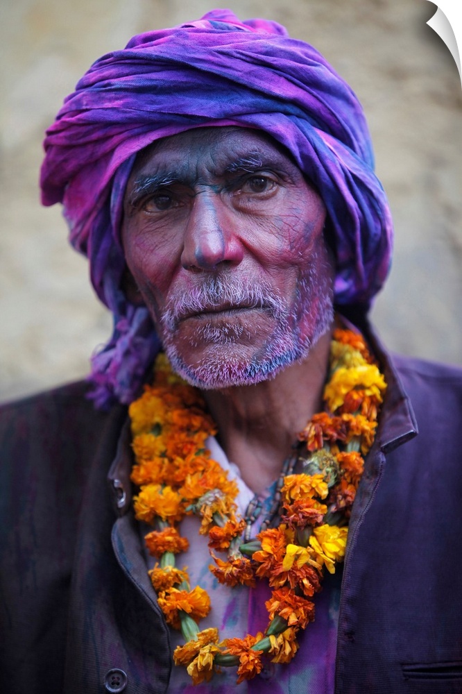 Man celebrating Holi festival, Nandgaon, Uttar Pradesh, India, Asia .