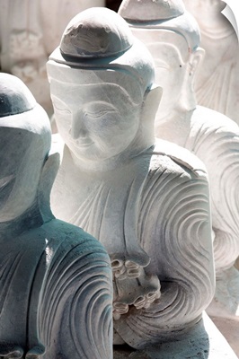Marble Buddha waiting to be finished at a stone carver's, Myanmar