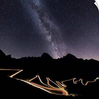Milky Way And Lights Of Car Trace At Stelvio Pass, Lombardy, Trentino Alto Adige, Italy