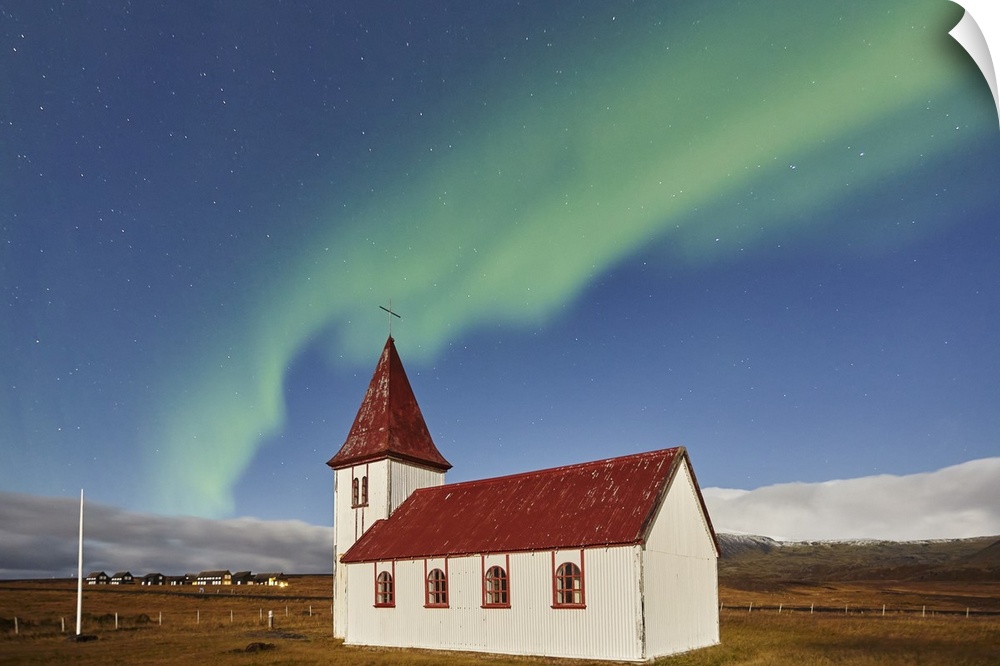 Night sky and Northern Lights (Aurora Borealis) over the church in the village of Hellnar, in Snaefellsjokull National Par...